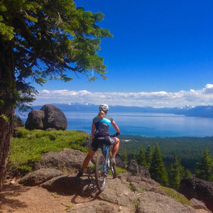 Mountain biker riding a foothill singletrack trail at golden hour